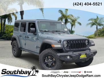 New 2026 Jeep Wrangler Willys in a Gray exterior color and Blackinterior. Southbay Chrysler Jeep Dodge Ram (424) 404-5521 pixelmotiondemo.com 