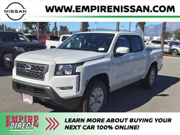 2024 Nissan Frontier SV in a Glacier White exterior color and Charcoalinterior. Ontario Auto Center ontarioautocenter.com 