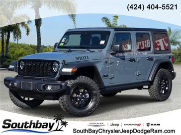 New 2026 Jeep Wrangler Willys in a Gray exterior color and Blackinterior. Southbay Chrysler Jeep Dodge Ram (424) 404-5521 pixelmotiondemo.com 