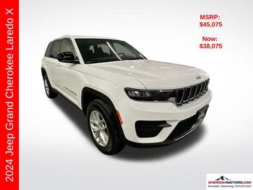 2024 Jeep Grand Cherokee Laredo X 4x4 in a Bright White Clear Coat exterior color and Blackinterior. Sheridan Motors CDJR 307-218-2217 sheridanmotor.com 