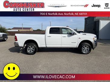 2022 RAM 2500 Laramie in a Bright White Clear Coat exterior color and Blackinterior. Cornhusker Auto Center 402-866-8665 cornhuskerautocenter.com 