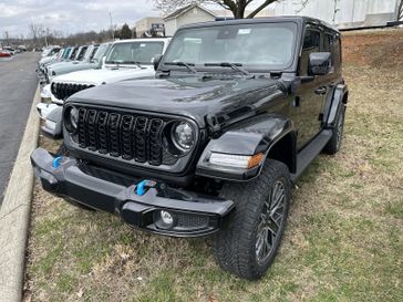 2024 Jeep Wrangler 4-door High Altitude 4xe in a Black Clear Coat exterior color and Blackinterior. Gupton Motors Inc 615-384-2886 guptonmotors.com 