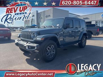 2024 Jeep Wrangler 4-door Sahara in a Anvil Clear Coat exterior color and Blackinterior. Legacy Auto Center 620-315-9264 legacyautocenter.net 