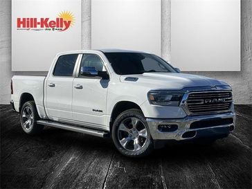 2024 RAM 1500 Laramie Crew Cab 4x2 5'7' Box in a Bright White Clear Coat exterior color and Blackinterior. Hill-Kelly Dodge (850) 786-2130 hillkellydodge.com 