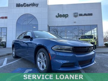 2023 Dodge Charger SXT Rwd in a Frostbite exterior color and Blackinterior. McCarthy Jeep Ram 816-434-0674 mccarthyjeepram.com 