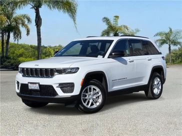 Used 2025 Jeep Grand Cherokee Laredo X 4x2 in a Bright White Clear Coat exterior color and Global Blackinterior. Southbay Chrysler Jeep Dodge Ram (424) 404-5521 pixelmotiondemo.com 