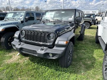 2024 Jeep Wrangler 4-door Sport S in a Black Clear Coat exterior color and Blackinterior. CDJR of Anytown 949-555-4321 pixelmotiondemo.com 