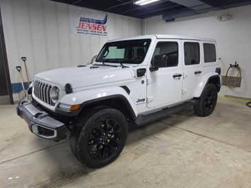 Used 2025 Jeep Wrangler 4xE Sahara 4xe in a Bright White Clear Coat exterior color and Blackinterior. Jensen Chrysler Dodge Jeep Ram 507-354-0542 jensenchryslerdodgejeepram.com 