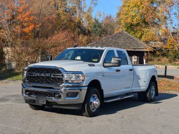 2024 RAM 3500 Tradesman Crew Cab 4x4 8' Box in a Bright White Clear Coat exterior color and Blackinterior. Brattleboro CDJR 802-251-1111 brattleborocdjr.com 