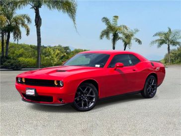 Used 2019 Dodge Challenger SXT RWD in a Torred Clear Coat exterior color and Blackinterior. Southbay Chrysler Jeep Dodge Ram (424) 404-5521 pixelmotiondemo.com 