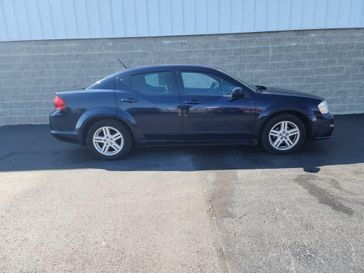 2013 Dodge Avenger SXT in a True Blue Pearl exterior color and Black Interiorinterior. Wilmington Auto Center Chrysler Dodge Jeep Ram (937) 556-6430 wilmingtonautocentercdjr.com 