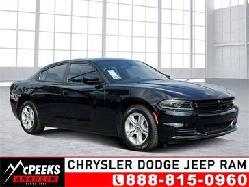 2023 Dodge Charger SXT Rwd in a Pitch Black exterior color and Blackinterior. McPeek's Chrysler Dodge Jeep Ram of Anaheim 888-861-6929 mcpeeksdodgeanaheim.com 
