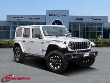 2024 Jeep Wrangler 4-door Rubicon X 4xe in a Silver Zynith Clear Coat exterior color and NAPPA LEATHERinterior. Champion Chrysler Jeep Dodge Ram 800-549-1084 pixelmotiondemo.com 