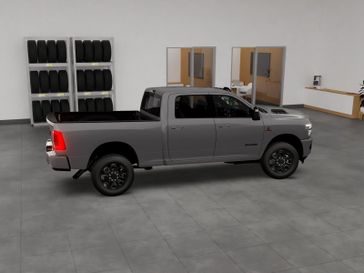 New 2026 RAM 2500 Laramie Crew Cab 4x4 6'4' Box in a Ceramic Gray Clear Coat exterior color. Kamaaina Motors 1-808-746-7956 kamaainamotors.com 
