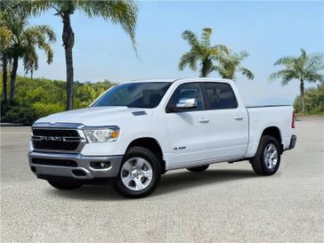 Used 2022 RAM 1500 Big Horn 4x4 Crew Cab 5'7 Box in a Bright White exterior color and Blackinterior. Southbay Chrysler Jeep Dodge Ram (424) 404-5521 pixelmotiondemo.com 