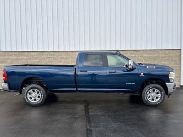 2024 RAM 3500 Laramie Crew Cab 4x4 8' Box in a Patriot Blue Pearl Coat exterior color and Blackinterior. Wilmington Auto Center Chrysler Dodge Jeep Ram (937) 556-6430 wilmingtonautocentercdjr.com 