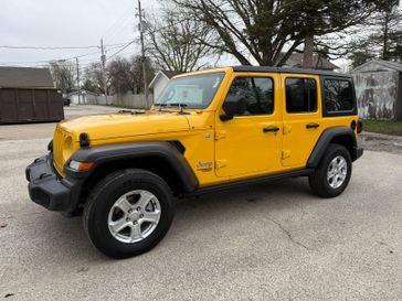 2018 Jeep Wrangler Unlimited Sport S in a Hellayella exterior color. Hometown Motors of Rockwell City 712-220-7644 hometownmotorsrc.com 