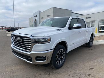 2025 RAM 1500 Laramie Crew Cab 4x4 5'7' Box in a Bright White Clear Coat exterior color and Blackinterior. Legacy Auto Center 620-315-9264 legacyautocenter.net 