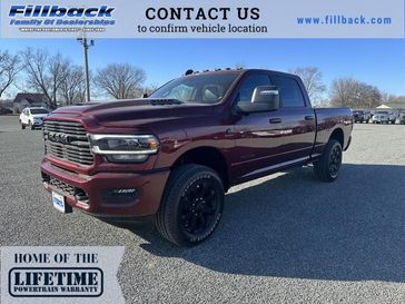 2024 RAM 2500 Laramie Crew Cab 4x4 6'4' Box in a Delmonico Red Pearl Coat exterior color. Fillback Chrysler, Dodge, Jeep & Ram 6083264700 