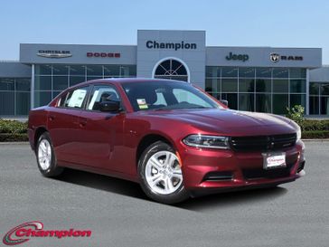 2023 Dodge Charger SXT Rwd in a Octane Red exterior color and HOUNDSTOOTHinterior. Champion Chrysler Jeep Dodge Ram 800-549-1084 pixelmotiondemo.com 