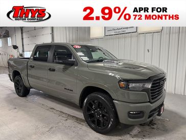 New 2026 RAM 1500 Laramie Crew Cab 4x4 5'7' Box in a Canyon Lake exterior color and Blackinterior. Thys Motor Company 319-318-6640 thysmotorco.com 