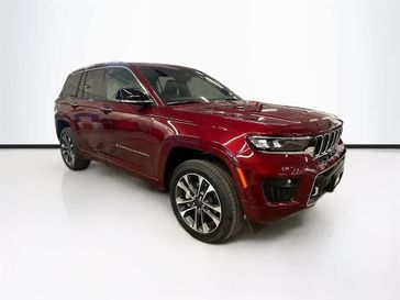 2024 Jeep Grand Cherokee Overland 4x4 in a Velvet Red Pearl Coat exterior color and Global Blackinterior. Sheridan Motors CDJR 307-218-2217 sheridanmotor.com 