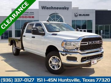 2023 RAM 2500 Tradesman Crew Cab 4x4 8' Box in a Bright White Clear Coat exterior color and Diesel Gray/Blackinterior. Wischnewsky Dodge 936-755-5310 wischnewskydodge.com 