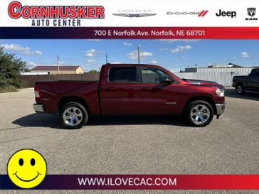 2021 RAM 1500 Big Horn in a Delmonico Red Pearl Coat exterior color and Blackinterior. Cornhusker Auto Center 402-866-8665 cornhuskerautocenter.com 