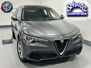 2021 Alfa Romeo Stelvio Sprint AWD w/Sunroof & Sound in a Vesuvio Gray Metallic exterior color and Black Heated Leatherinterior. Schmelz Countryside Alfa Romeo (651) 867-3222 schmelzalfaromeo.com 