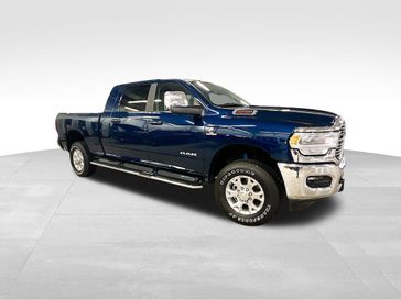 2024 RAM 2500 Laramie Mega Cab 4x4 6'4' Box in a Patriot Blue Pearl Coat exterior color and Blackinterior. Sheridan Motors CDJR 307-218-2217 sheridanmotor.com 