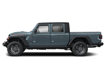 New 2026 Jeep Gladiator Mojave in a Anvil Clear Coat exterior color and Blackinterior. Perkins La Junta 719-383-2250 perkinslajunta.com 
