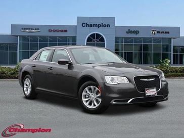 2023 Chrysler 300 Touring in a Granite Crystal Metallic exterior color and CLOTHinterior. Champion Chrysler Jeep Dodge Ram 800-549-1084 pixelmotiondemo.com 