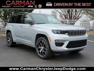2024 Jeep Grand Cherokee Summit Reserve 4xe in a Silver Zynith exterior color and Global Black - ECX7interior. Carman Chrysler Jeep Dodge Ram 302-317-2378 carmanchryslerjeepdodge.com 