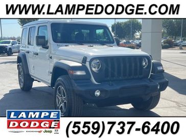 2023 Jeep Wrangler 4-door Sport S 4x4 in a Bright White Clear Coat exterior color and Blackinterior. Lampe Chrysler Dodge Jeep RAM 559-471-3085 pixelmotiondemo.com 