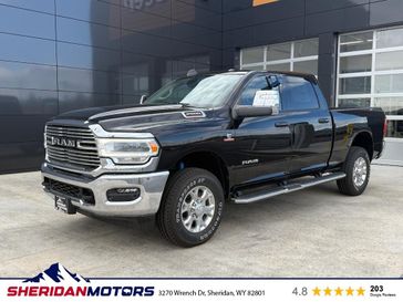 2024 RAM 2500 Laramie Crew Cab 4x4 6'4' Box in a Diamond Black Crystal Pearl Coat exterior color and Blackinterior. Sheridan Motors CDJR 307-218-2217 sheridanmotor.com 