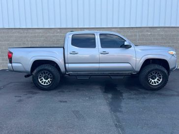 2021 Toyota Tacoma SR Double Cab 5 Bed V6 AT in a Silver Sky Metallic exterior color and Cementinterior. Wilmington Auto Center Chrysler Dodge Jeep Ram (937) 556-6430 wilmingtonautocentercdjr.com 