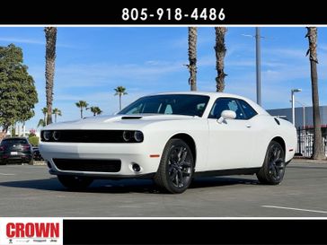 2023 Dodge Challenger SXT in a White Knuckle Clear Coat exterior color and Blackinterior. Ventura Auto Center 866-978-2178 venturaautocenter.com 
