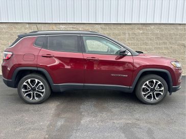 2022 Jeep Compass Limited in a Velvet Red Pearl Coat exterior color and Blackinterior. Wilmington Auto Center Chrysler Dodge Jeep Ram (937) 556-6430 wilmingtonautocentercdjr.com 