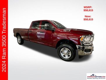 2024 RAM 3500 Tradesman Crew Cab 4x4 8' Box in a Delmonico Red Pearl Coat exterior color and Diesel Gray/Blackinterior. Sheridan Motors CDJR 307-218-2217 sheridanmotor.com 