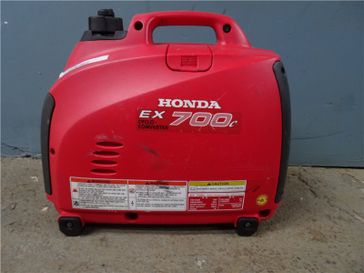 2004 Honda EX700  in a Red exterior color. New England Powersports 978 338-8990 pixelmotiondemo.com 