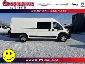 2024 RAM ProMaster Cargo Van SLT in a Bright White Clear Coat exterior color and Blackinterior. Cornhusker Auto Center 402-866-8665 cornhuskerautocenter.com 