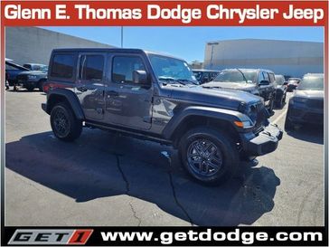 2024 Jeep Wrangler 4-door Sport S in a Granite Crystal Metallic Clear Coat exterior color and Blackinterior. Glenn E Thomas 100 Years Of Excellence (866) 340-5075 getdodge.com 