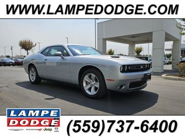 2023 Dodge Challenger SXT in a Triple Nickel exterior color and Blackinterior. Lampe Chrysler Dodge Jeep RAM 559-471-3085 pixelmotiondemo.com 