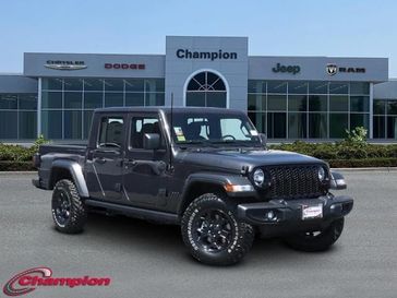 2023 Jeep Gladiator Willys 4x4 in a Granite Crystal Metallic Clear Coat exterior color and CLOTHinterior. Champion Chrysler Jeep Dodge Ram 800-549-1084 pixelmotiondemo.com 