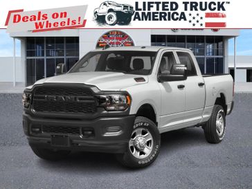 2024 RAM 2500 Tradesman in a Bright White Clear Coat exterior color and Blackinterior. Lifted Truck America 888-267-0644 liftedtruckamerica.com 