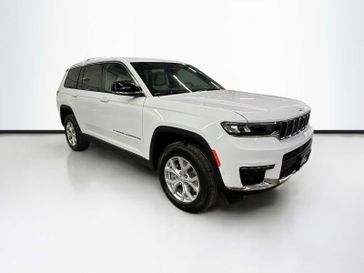 2024 Jeep Grand Cherokee L Limited 4x4 in a Bright White Clear Coat exterior color and Wicker Beige/Blackinterior. Sheridan Motors CDJR 307-218-2217 sheridanmotor.com 