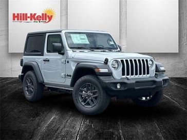 2024 Jeep Wrangler 2-door Sport S in a Silver Zynith Clear Coat exterior color and Blackinterior. Hill-Kelly Dodge (850) 786-2130 hillkellydodge.com 