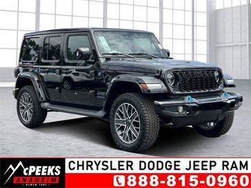 2024 Jeep Wrangler 4-door High Altitude 4xe in a Black Clear Coat exterior color and Blackinterior. McPeek's Chrysler Dodge Jeep Ram of Anaheim 888-861-6929 mcpeeksdodgeanaheim.com 