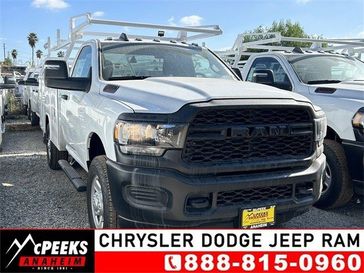 2023 RAM 3500 Tradesman Chassis Regular Cab 4x2 60' Ca in a Bright White Clear Coat exterior color and Blackinterior. McPeek's Chrysler Dodge Jeep Ram of Anaheim 888-861-6929 mcpeeksdodgeanaheim.com 