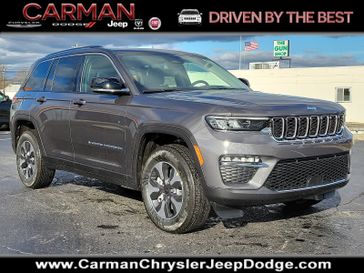 2024 Jeep Grand Cherokee 4xe in a Baltic Gray Metallic Clear Coat exterior color and Global Black - B6X7interior. Carman Chrysler Jeep Dodge Ram 302-317-2378 carmanchryslerjeepdodge.com 